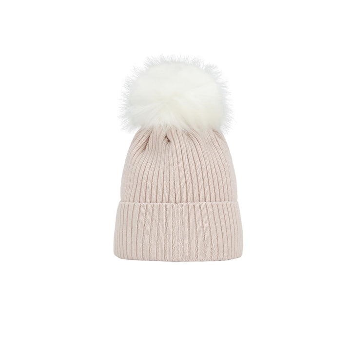a white hat with a white fur pom