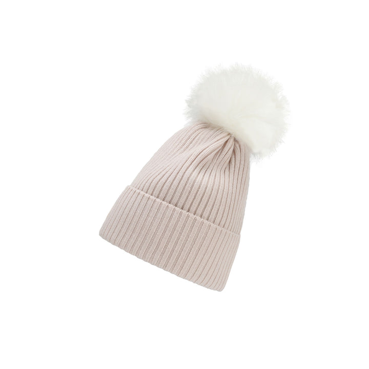 a white hat with a white fur pom