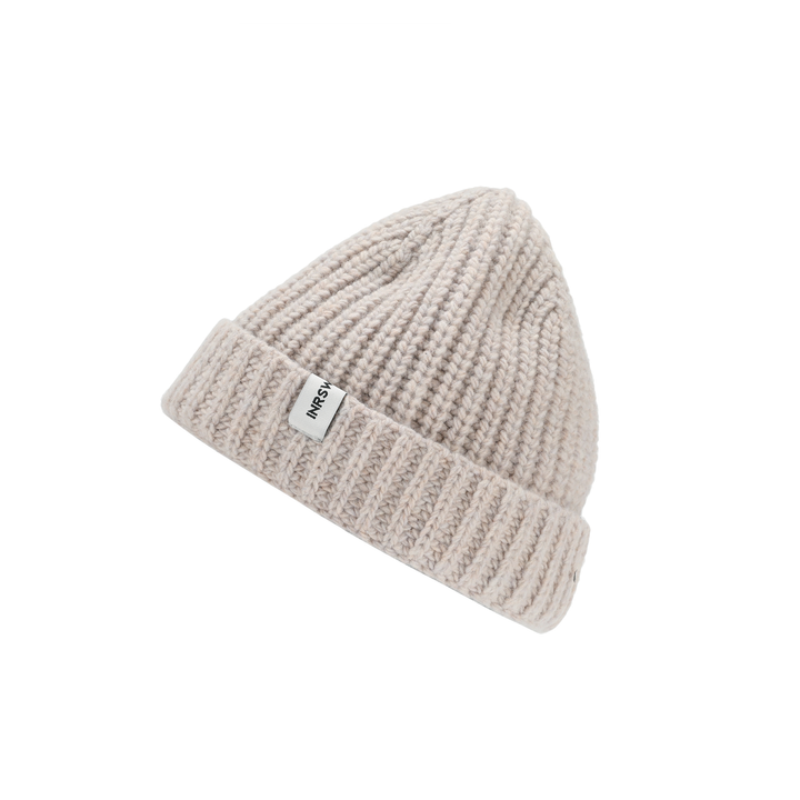 a white knitted hat on a white background