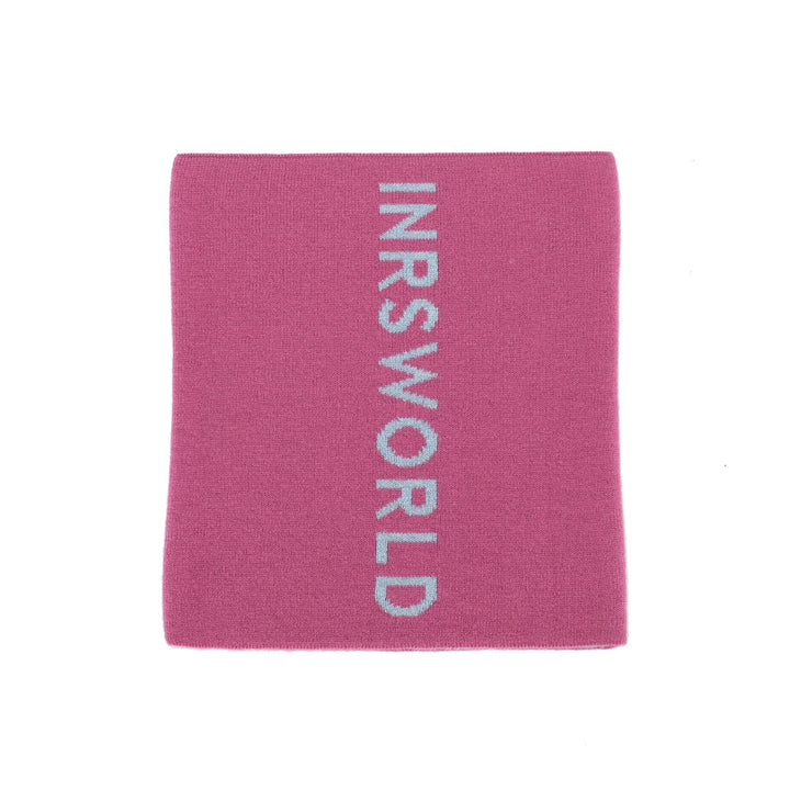 a pink towel with white writing on it