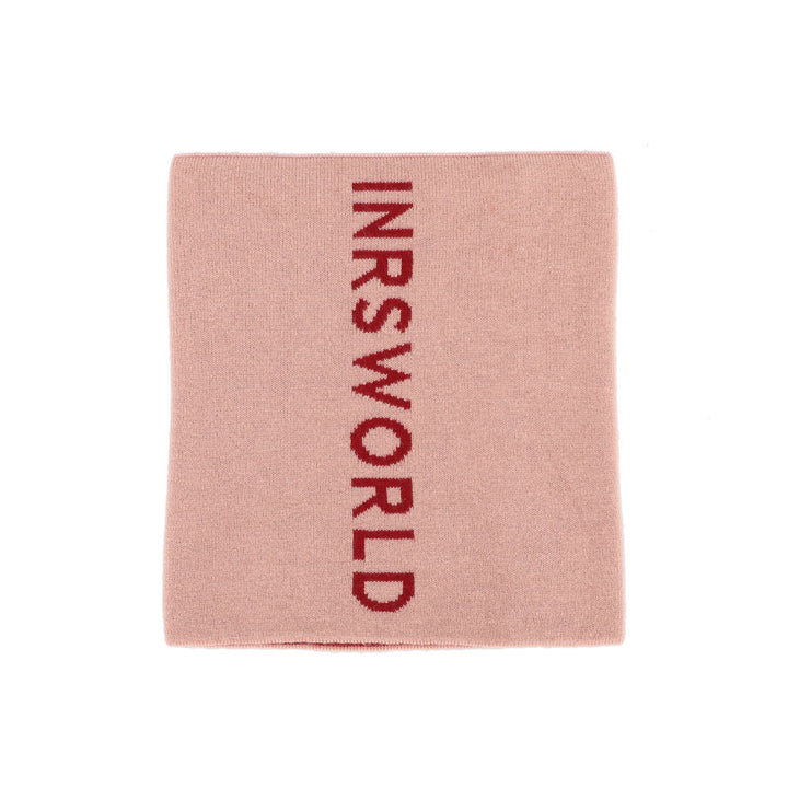 a pink towel with a red inscription on it