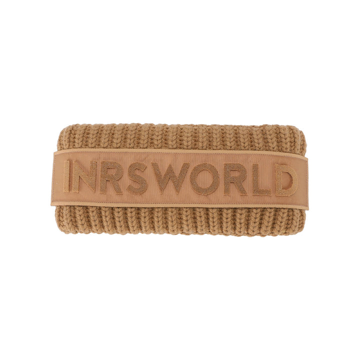 a brown wristband that says,'n isworld '