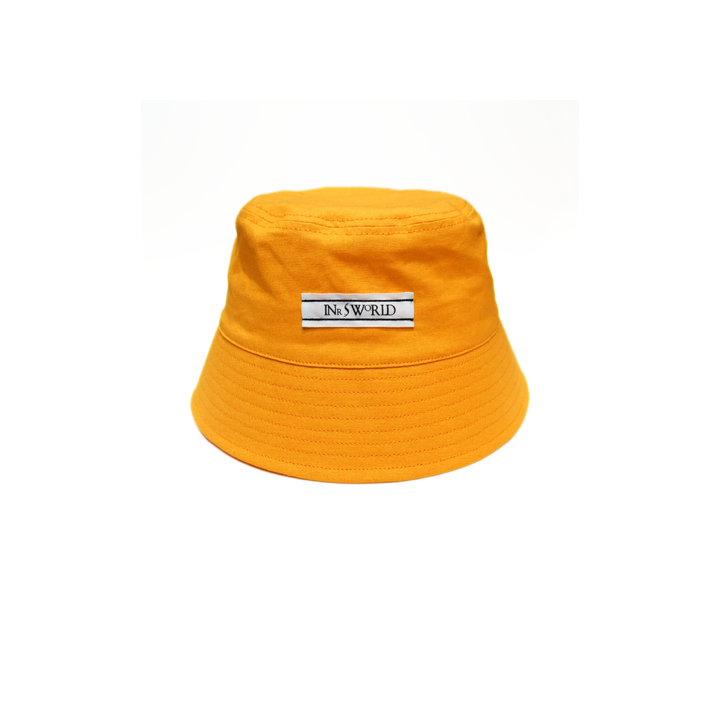 a yellow hat with a name tag on it